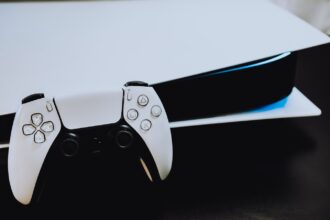 a close up of two video game controllers