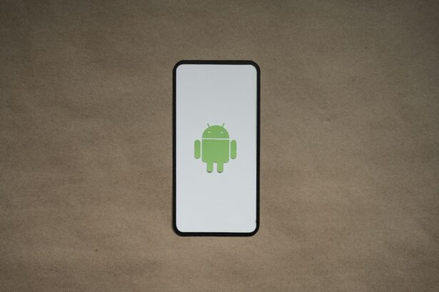a cell phone with a green icon on it