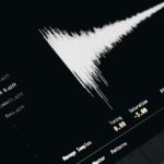 A computer screen with a sound wave on it