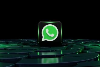a green whatsapp icon sitting on top of a maze