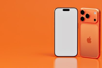 Two orange smartphones on an orange background.