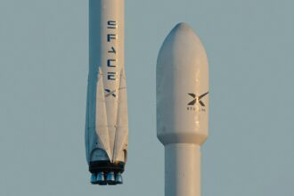a spacex rocket is flying in the sky