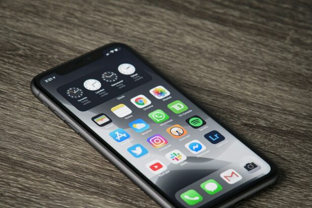 black iphone 5 on brown wooden table