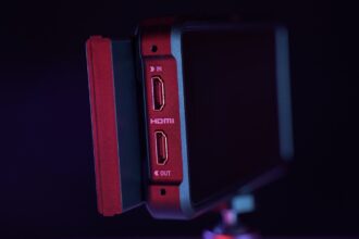a close up of a red and black device