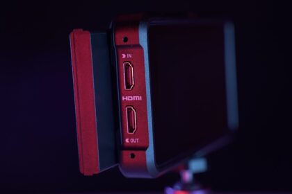 a close up of a red and black device