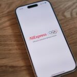 A close up of a cell phone on a table