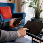 Hands setting up credit freeze on devices