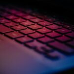 a close up of a keyboard with a blurry background